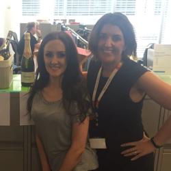 Fundraisers in an office smiling at the camera