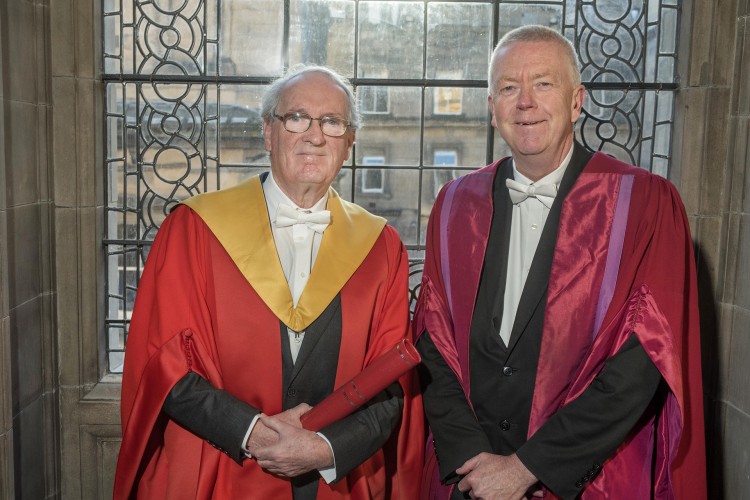Donald MacDonald CBE and Prof Sir John Savill wearing graduation robes