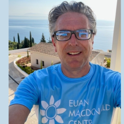 A picture of Philip Golding with a Euan MacDonald Centre tshirt