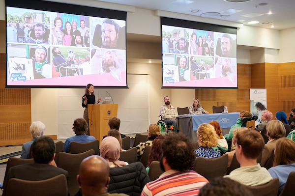 Euan MacDonald legacy with speakers and audience